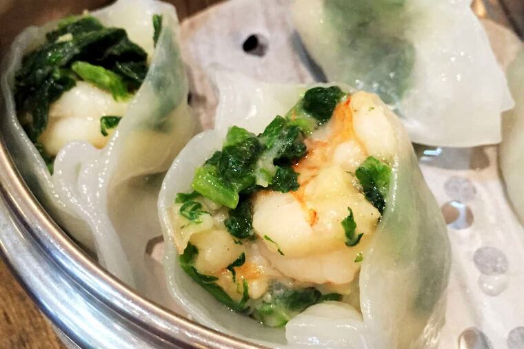Steamed shrimp and snow pea leaf dumplings from the new Nom Wah Tea Parlor in Chinatown. ( Craig LaBan / Staff )
