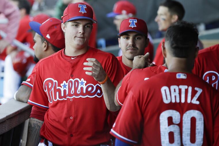 Phillies minor league outfielder Mickey Moniak greets his teammates late in the game during a split squad spring training game against the Baltimore Orioles at Spectrum Field in Clearwater, FL on Saturday, March 3, 2018.