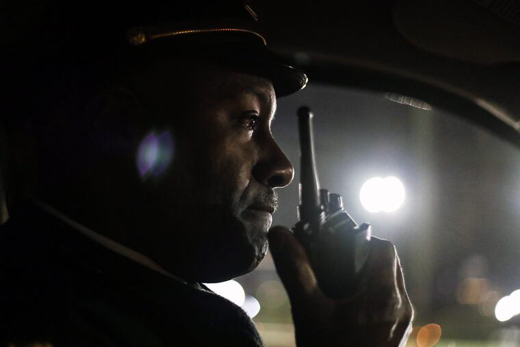 Temple police Lt. Russell Moody on patrol during his eight-hour overnight shift on Friday, Nov. 14, 2014. (Andrew Thayer / Staff Photographer)