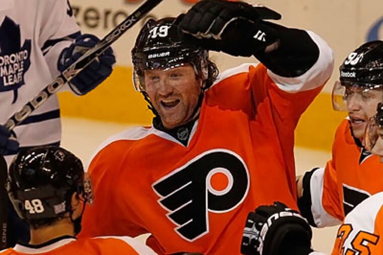 Scott Hartnell's two goals were overshadowed by the injury Chris Pronger suffered in the first period.(Ron Cortes/Staff Photographer)