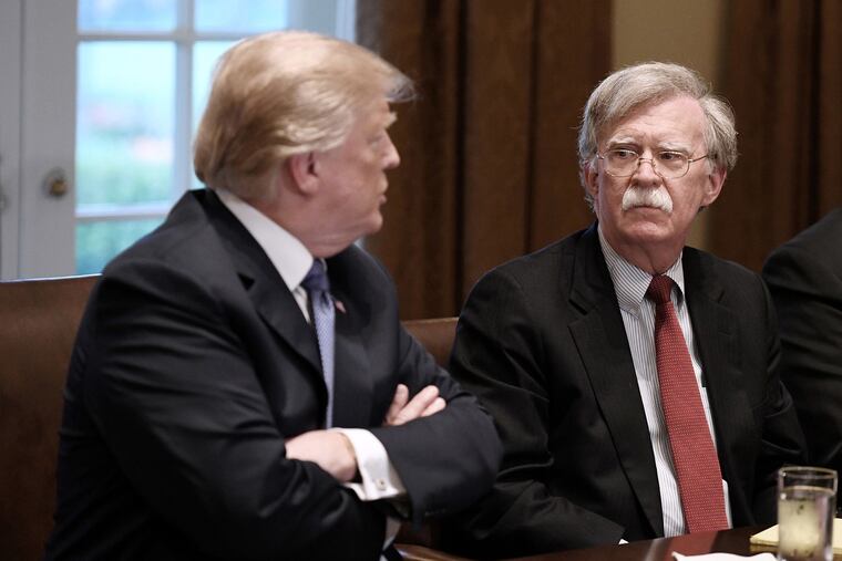 U.S. President Donald Trump, left, and John Bolton, right, national security adviser, attend a briefing from Senior Military Leadership in the Cabinet Room of the White House on April 9, 2018 in Washington, D.C. Trump fired Bolton Tuesday morning, announcing in a tweet that he'd told him Monday night that "his services are no longer needed." (Olivier Douliery/Abaca Press/TNS)