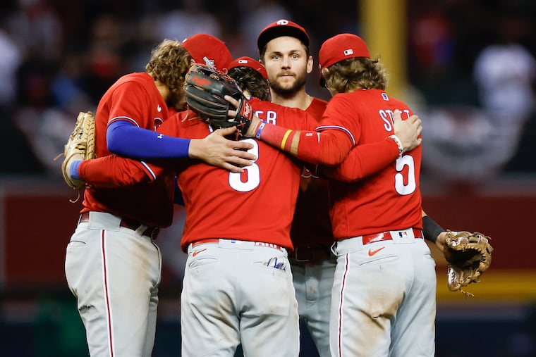 Trea Turner (middle) was the only Phillies infielder who remained in his position after the deadline trade for Luis Arraez.