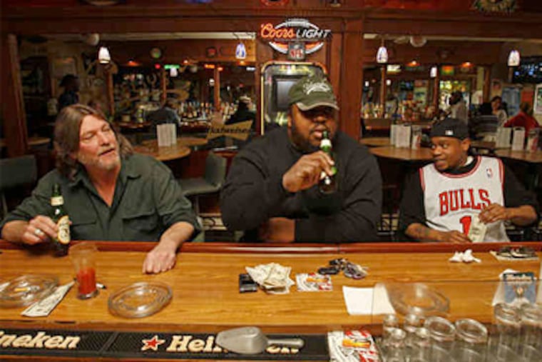 Having a beer at Chelsy's Tavern in Downingtown after turning in their Reynolds ID badges are (from left) Rick Wilson, who worked three years at the plant; Walt Hudson, a 15-year employee; and Corey Dickinson, a 10-year veteran.