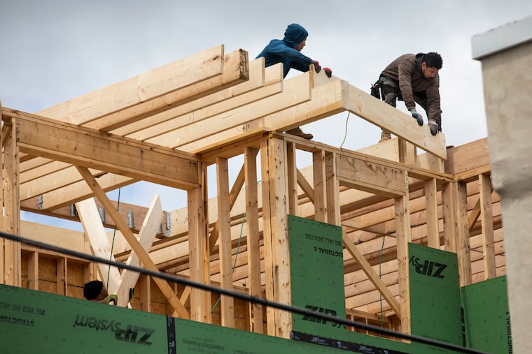 Construction work resumed on a home at Bancroft and Reed Streets in South Philadelphia on May 1 without mandated face coverings. Gov. Tom Wolf had banned most construction in Pennsylvania in March to slow the spread of the coronavirus.