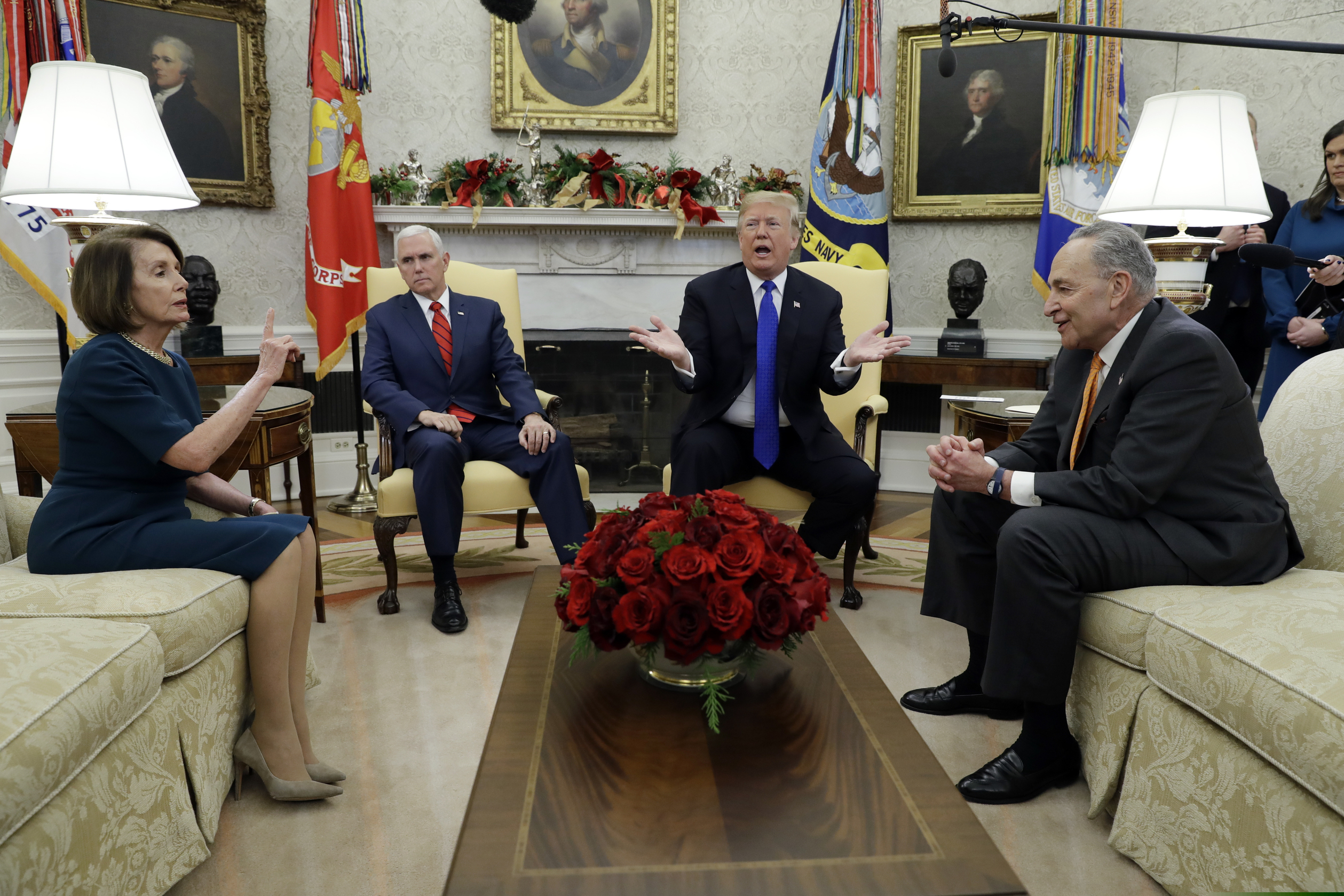 President Trump and Vice President Mike Pence, second left, meet with Senate Minority Leader Chuck Schumer, D-N.Y., right, and House Minority Leader Nancy Pelosi, D-Calif., in the Oval Office of the White House, Tuesday, Dec. 11, 2018, in Washington. (AP Photo/Evan Vucci)