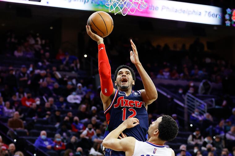 Sixers forward Tobias Harris shooting the basketball against LA Clippers guard Amir Coffey on Jan. 21.
