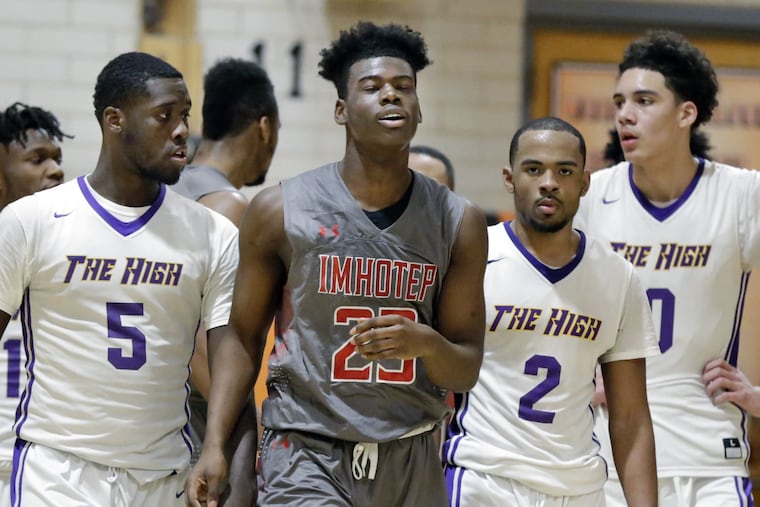 Imhotep Charter's Jamil Riggins walks to the foul line in last season's 61-48 defeat of Camden High at Woodrow Wilson High.