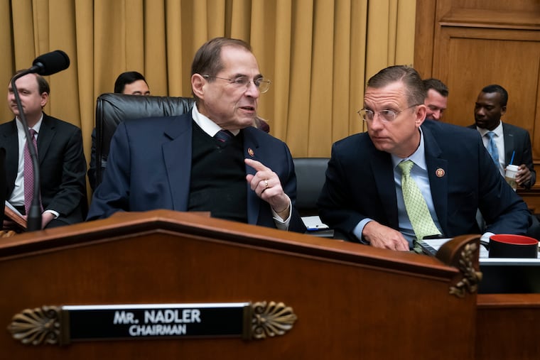 House Judiciary Committee Chair Jerrold Nadler, D-N.Y., joined at right by Ranking Member Doug Collins, R-Ga., prepares for the start of a hearing on The Equality Act, a comprehensive nondiscrimination bill for LGBT rights, on Capitol Hill in Washington, Tuesday, April 2, 2019. Nadler is preparing subpoenas seeking special counsel Robert Mueller's full Russia report as the Justice Department appears likely to miss an April 2 deadline set by Democrats for the report's release.