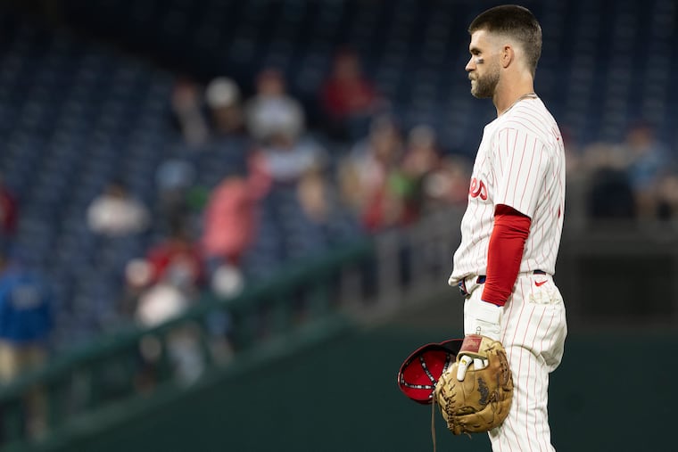 Bryce Harper wasn't in the Phillies' lineup Friday night because of lingering soreness in his right wrist, according to manager Rob Thomson.
