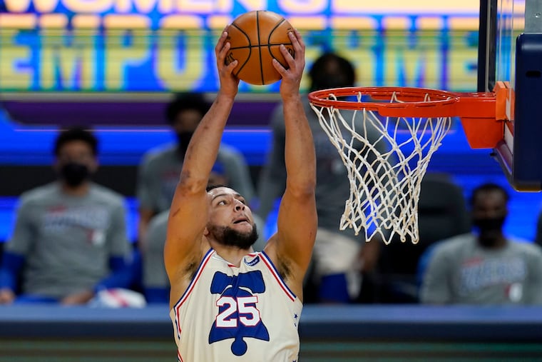 Ben Simmons dunks against the Golden State Warriors during the first half Tuesday.