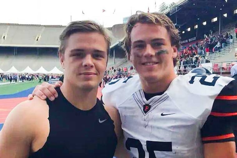Friends and former Princeton University football players Tiger Bech (left) and Ryan Quigley (right) pose for a photo.