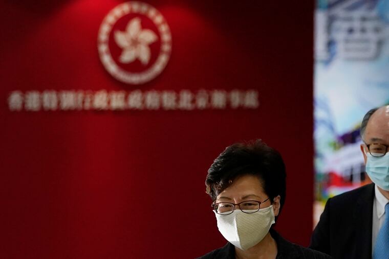 Hong Kong Chief Executive Carrie Lam attends a press conference held in Beijing, China on Friday, Nov. 6, 2020. Lam received credit from a top Chinese official on Friday for restoring order and reviving the economy in the semi-autonomous territory.