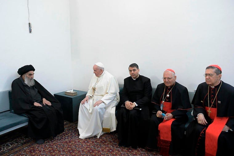 Shiite Muslim leader, Grand Ayatollah Ali al-Sistan, left, and Pope Francis, 2nd left, and Christian Priests in Najaf, Iraq, on March 6.