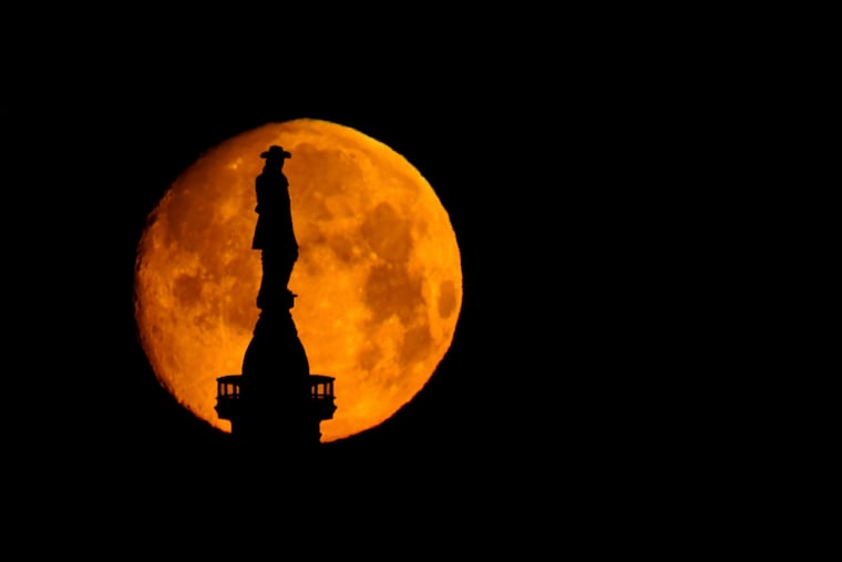 The moon sets behind a statue of William Penn atop City Hall in Philadelphia. When any person, anywhere in the world, claims, “I have rights,” they are nodding toward the Enlightenment ideals at the heart of the U.S. founding, writes Eric Hartman.