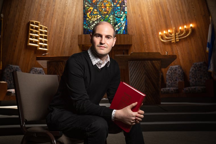 Rabbi Michael Perice on the bimah, or altar, at Temple Sinai in Cinnaminson, NJ. He has served as the congregation's spiritual leader since last July 1.