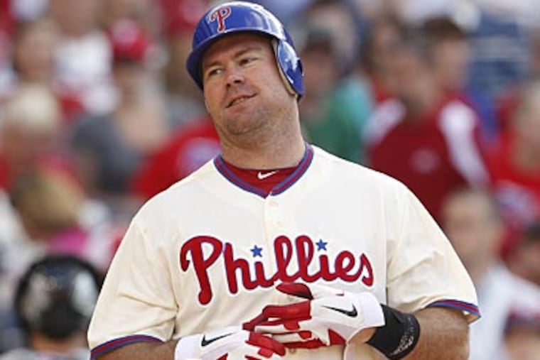 "I had time to give my address and set the phone down, and then I caught the baby," Ty Wigginton said. (Ron Cortes/Staff Photographer)