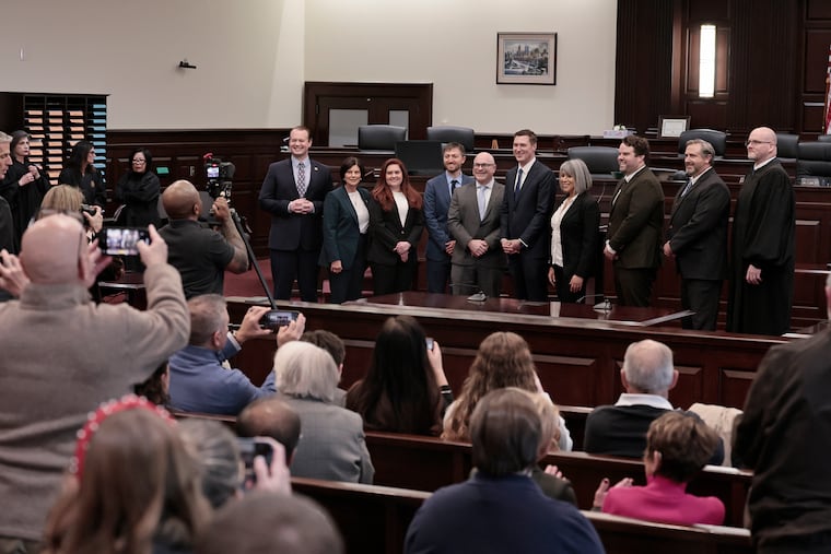 The Chester County Commissioners joined four newly elected officials and three magisterial judges in Chester County after they took the oath of office on Saturday at the Chester County Justice Center: (from left) Commissioner Eric Roe, Commissioner Marian Moskowitz, Coroner Sophia Garcia-Jackson, Controller Nick Cherubino, Magisterial District Judge Anthony diFrancesca, Commissioner Josh Maxwell, Clerk of Courts Caroline Bradley, Prothonotary Alex Christy, Magisterial District Judge Joe Heffern, and Magisterial District Judge James C. Kovaleski.