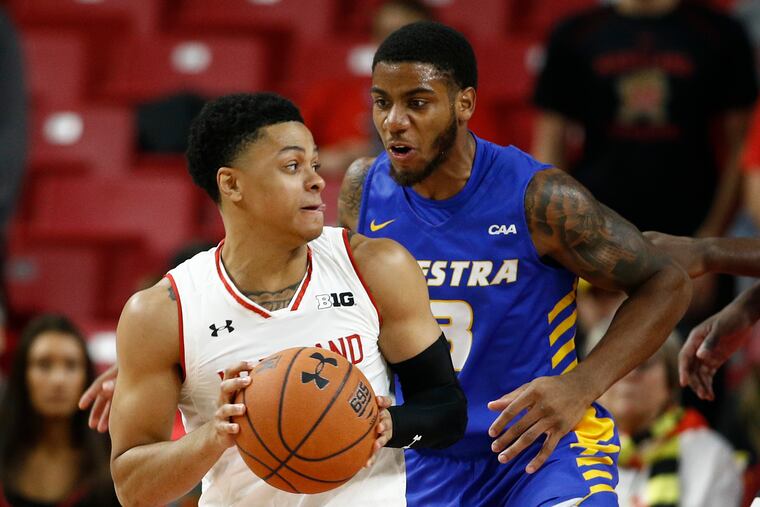 Hofstra guard Justin Wright-Foreman, right, defending Maryland guard Anthony Cowan Jr. during a November game.