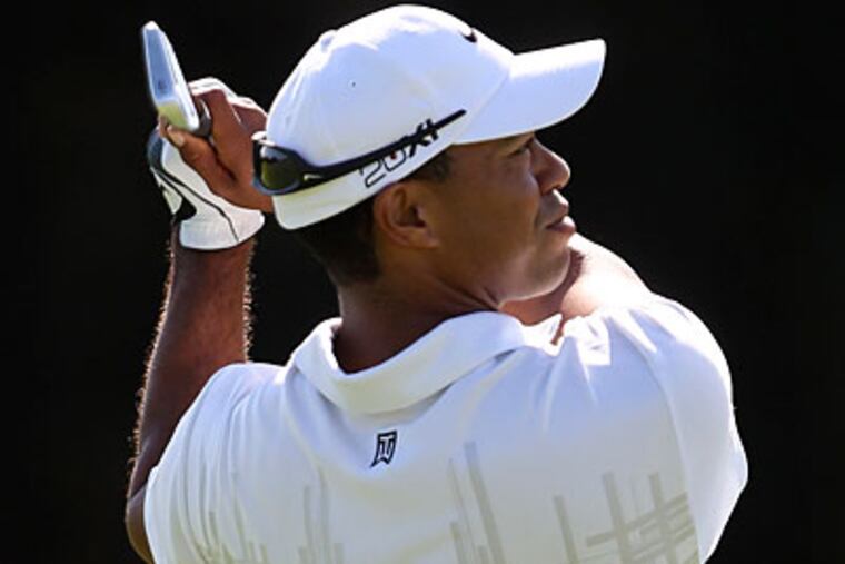 Tiger Woods put together his best back-to-back rounds of the year at the Australian Open. (Rob Griffith/AP)