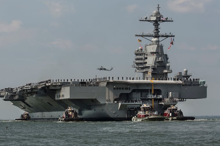 The aircraft carrier USS Gerald R. Ford is among the ships whose passage to the Middle East was tracked by Chinese firms.