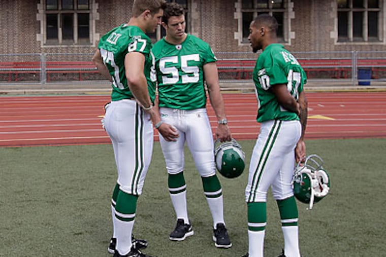 Stewart Bradley, Brent Celek and DeSean Jackson model the Eagles' new jerseys. (David Maialetti/Staff Photographer)