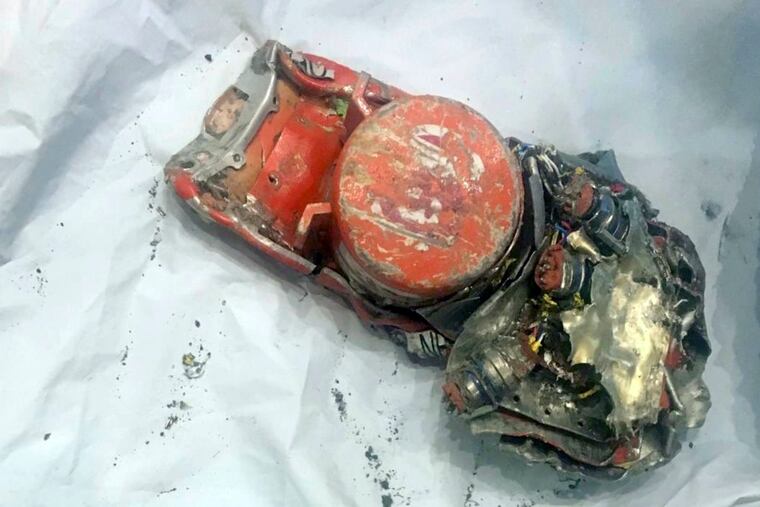 This photo provided by by the French air accident investigation authority BEA on Thursday shows one of the black box flight recorders from the crashed Ethiopian Airlines jet.