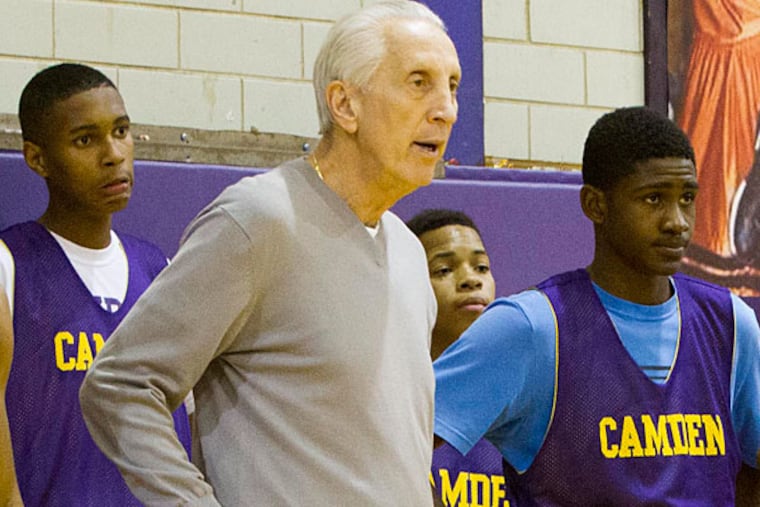 Coach John Valore with Camden players. (David M Warren/Staff Photographer)
