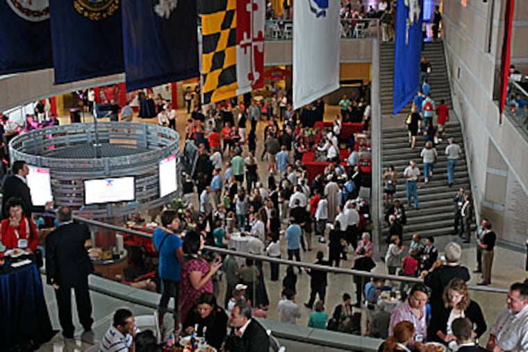 Members of the National Conference of State Legislatures at their cocktail reception at the National Constitution Center on Tuesday, July 21, 2009. The NCSL had about 500 fewer attendees that it had orginally projected which cuts down on its revenue. (Ron Cortes/Staff Photographer)