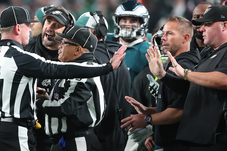 Philadelphia Eagles head coach Nick Sirianni (left) and Eagles chief security officer Dom DiSandro (right), talk with officials after DiSandro and 49ers Dre Greenlaw were involved in an incident on the Eagles sideline at Lincoln Financial Field in Philadelphia, Pa. on Sunday, Dec. 3, 2023.