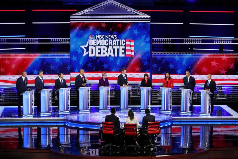 From left, Democratic presidential candidates New York City Mayor Bill De Blasio, Rep. Tim Ryan (D-Ohio), former housing secretary Julian Castro, Sen. Cory Booker (D-N.J.), Sen. Elizabeth Warren (D-Mass.), former Texas congressman Beto O'Rourke, Sen. Amy Klobuchar (D-Minn.), Rep. Tulsi Gabbard (D-Hawaii), Washington Gov. Jay Inslee, and former Maryland congressman John Delaney at the first night of the Democratic presidential debate in Miami in June. The Democrats debate again in Detroit July 30 and 31. (Joe Raedle/Getty Images/TNS)