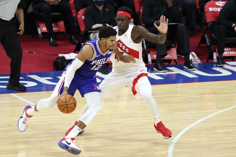 Tobias Harris (left) drives against Toronto's Pascal Siakam on Tuesday night. Harris filled the role of the Sixers' No. 2 scorer very well.