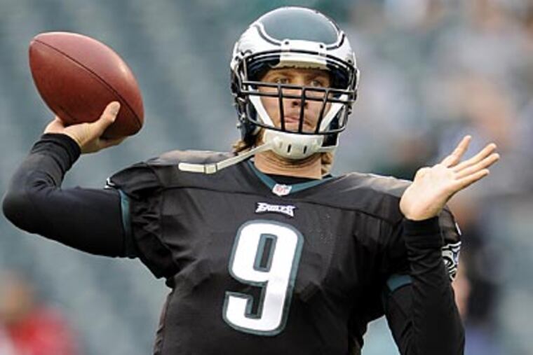 Eagles rookie quarterback Nick Foles has been serving as Michael Vick's backup so far this season. (Michael Perez/AP)