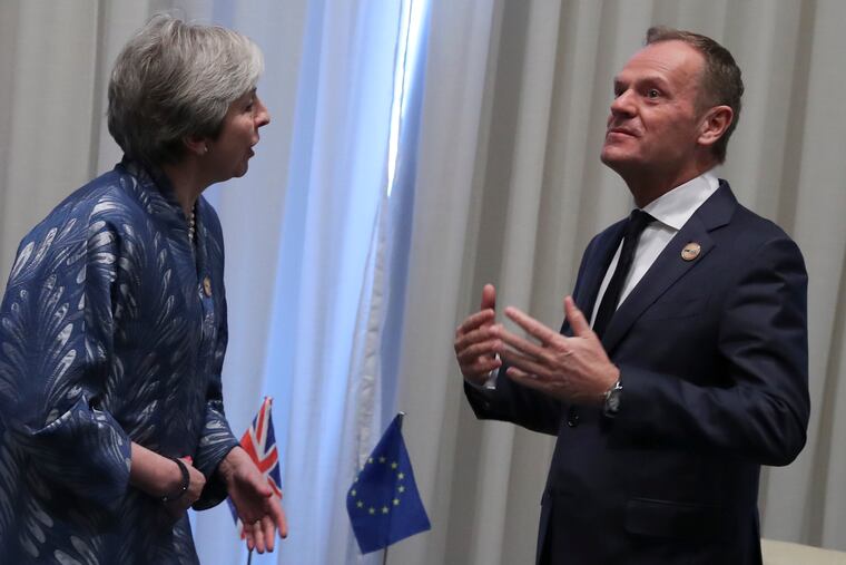 European Union Council President Donald Tusk, right, speaks with British Prime Minister Theresa May during a bilateral meeting on the sidelines of a summit of EU and Arab leaders at the Sharm El Sheikh convention center in Sharm El Sheikh, Egypt, Sunday, Feb. 24, 2019. British Prime Minister Theresa May is set to hold Brexit talks with European Council President Donald Tusk ahead of a potentially pivotal week for her plans to lead her country out of the European Union. (AP Photo/Francisco Seco, Pool)