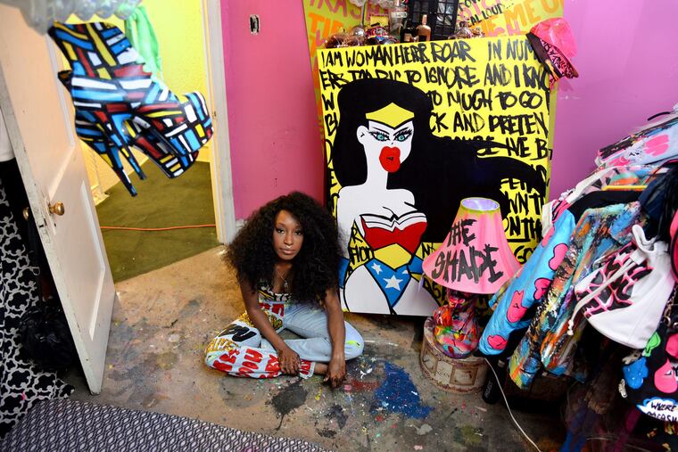 Mt. Airy designer Iris Bonner poses in her bedroom / studio Monday, August 31, 2105. Amber Rose got lots of attention wearing a jumpsuit from her line - Thesepinklips - to the VMAs. TOM GRALISH / Staff Photographer