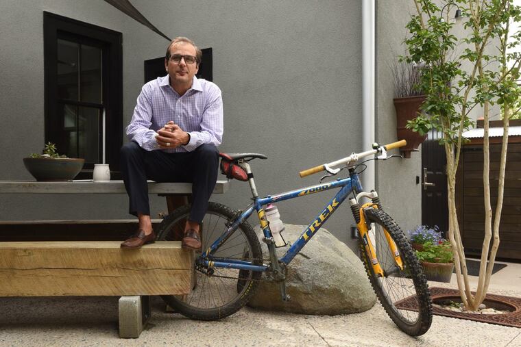 Developer Peter Rotelle, founder of Rotelle Development Co., at his office’s outdoor patio in South Coventry Township. Once a week, he prepares lunch for his staff, often using the grill. Brad Bower/Philadelphia Inquirer