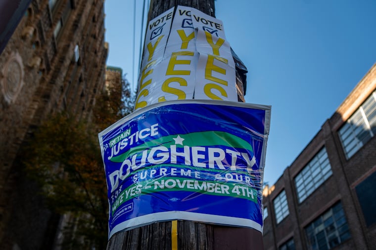 An election sign in South Philadelphia on Sunday urged voters to retain Pennsylvania Supreme Court Justice Kevin Dougherty for another 10-year term.