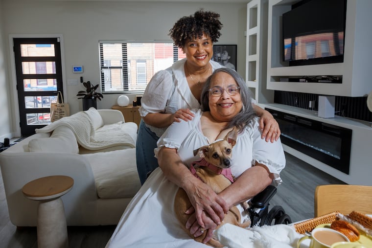 Dayna Marie Hood and mother, Donna Lucille Hood, and Dayna's dog, Sylvie, in their new home in Philadelphia's Brewerytown.