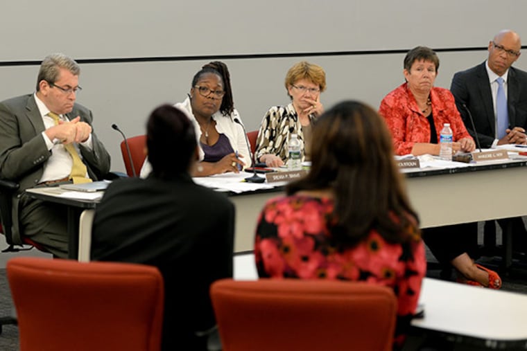 SRC members hear testimony at yesterday's annual review of the city's charter schools. Two that didn't pass can appeal the decision. TOM GRALISH / STAFF PHOTOGRAPHER