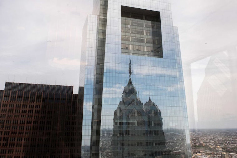 Comcast, its headquarters tower seen in this 2017 file photo, opposes federal regulations that would prohibit internet providers from discriminating against content in download speed or price.