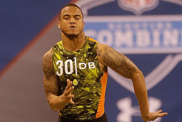 Despite running with a torn labrum in his shoulder, Dee Milliner posted the second-best time among cornerbacks. (Dave Martin/AP)