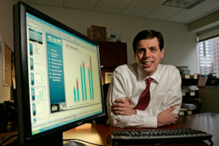 Greg Parks explains to retailers how important it is to safeguard their customer database. On screen, part of his presentation. He is a lawyer with the Philadelphia firm of Morgan, Lewis & Bockius L.L.P.