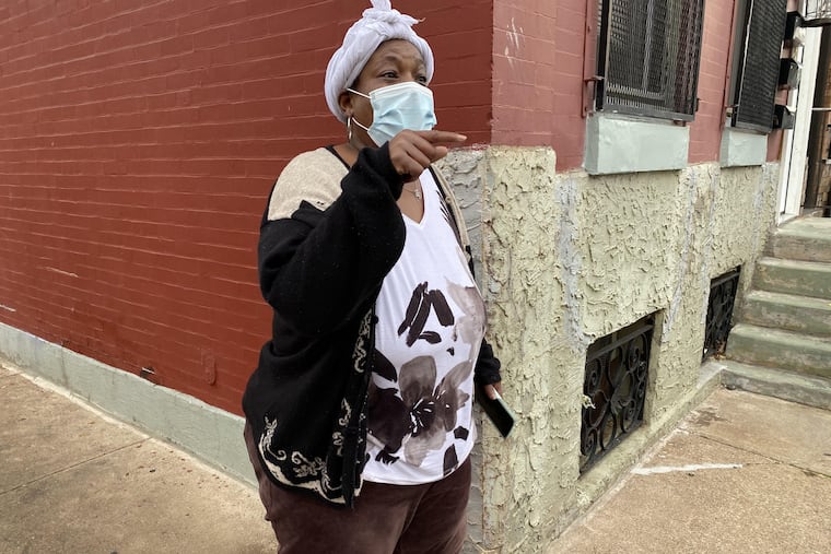 Gwendolyn Toler, grandmother of 18-year-old Joseph Lighty, speaks Wednesday at 13th and Carpenter Streets in South Philadelphia, the day after her grandson and another teenager were shot at a basketball court on the 1200 block of Carpenter Street.