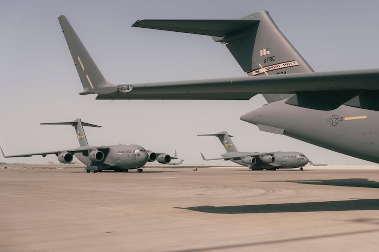 U.S. Air Force C-17 cargo planes sit parked at al-Udeid Air Base in Qatar in 2021: The Pentagon is withdrawing some troops and assets in Qatar.