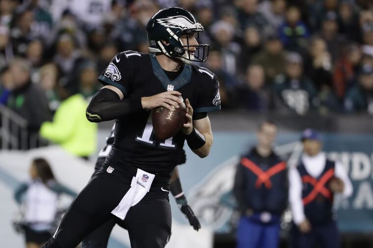 Eagles quarterback Carson Wentz looks for a receiver against the Packers, Monday, Nov. 28, 2016, in Philadelphia.
