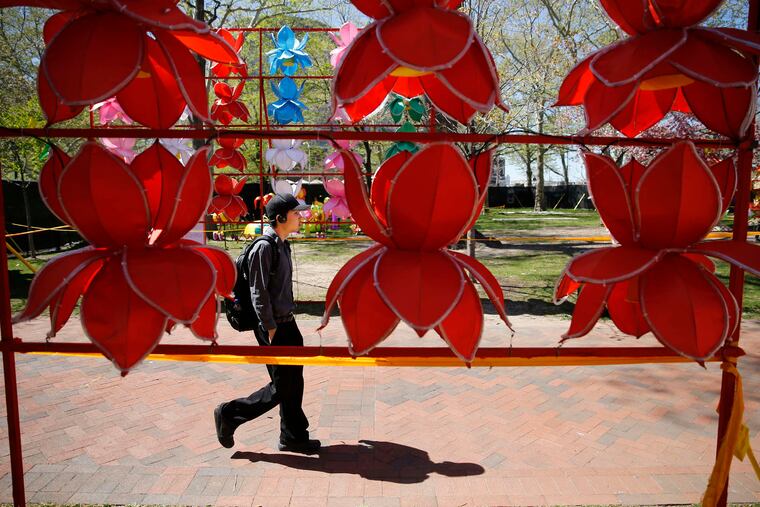Chinese Lantern Festival flowers decorate Franklin Square near the entrance at Seventh and Race Streets. The festival will run through June 12.