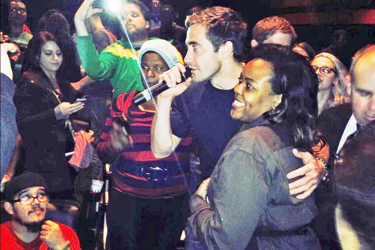 Jake Gyllenhaal poses with fans at a screening of his new movie "Nightcrawler" at the Rave Cinemas University City 6 (4012 Walnut St.)