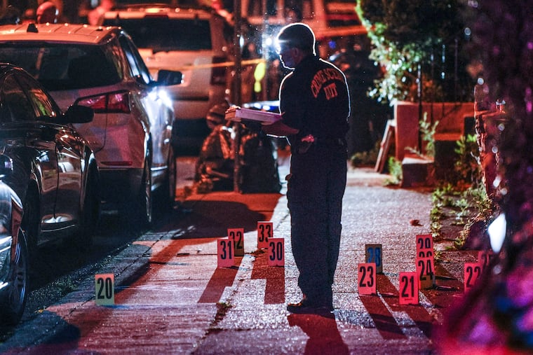 Police on the scene in the 100 block of East Albanus where a woman and her 2-year-old daughter were caught in the crossfire.