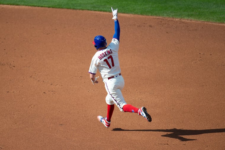 Rhys Hoskins and the Phillies have been much better at home than on the road in recent seasons.