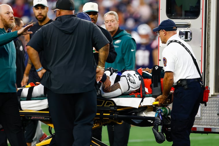 Eagles Ja'Quinden Jackson is taken off the field in a stretcher early during the first quarter of an NFL preseason football game against the Patriots Saturday, Aug. 22, 2026, in Foxborough, Mass.