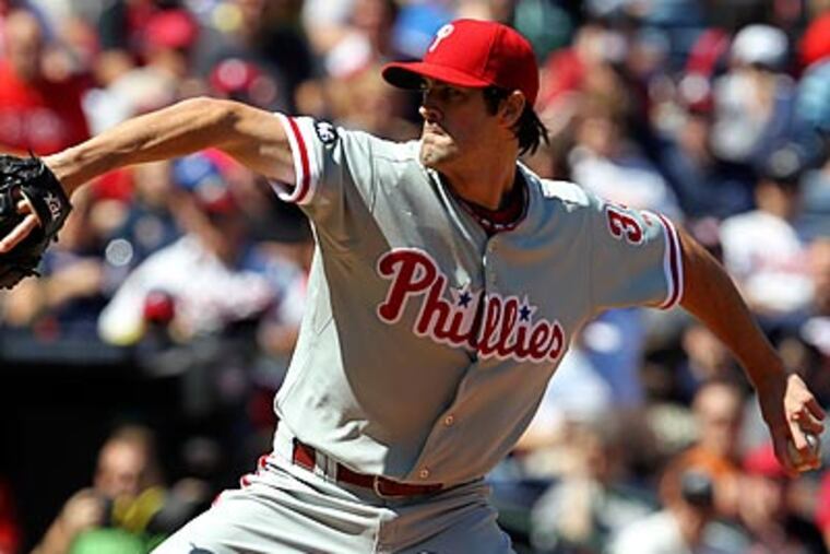 Cole Hamels, who finished the regular season with a 3.06 ERA, will have to wait until Game 3 to get a start. (John Bazemore/AP)